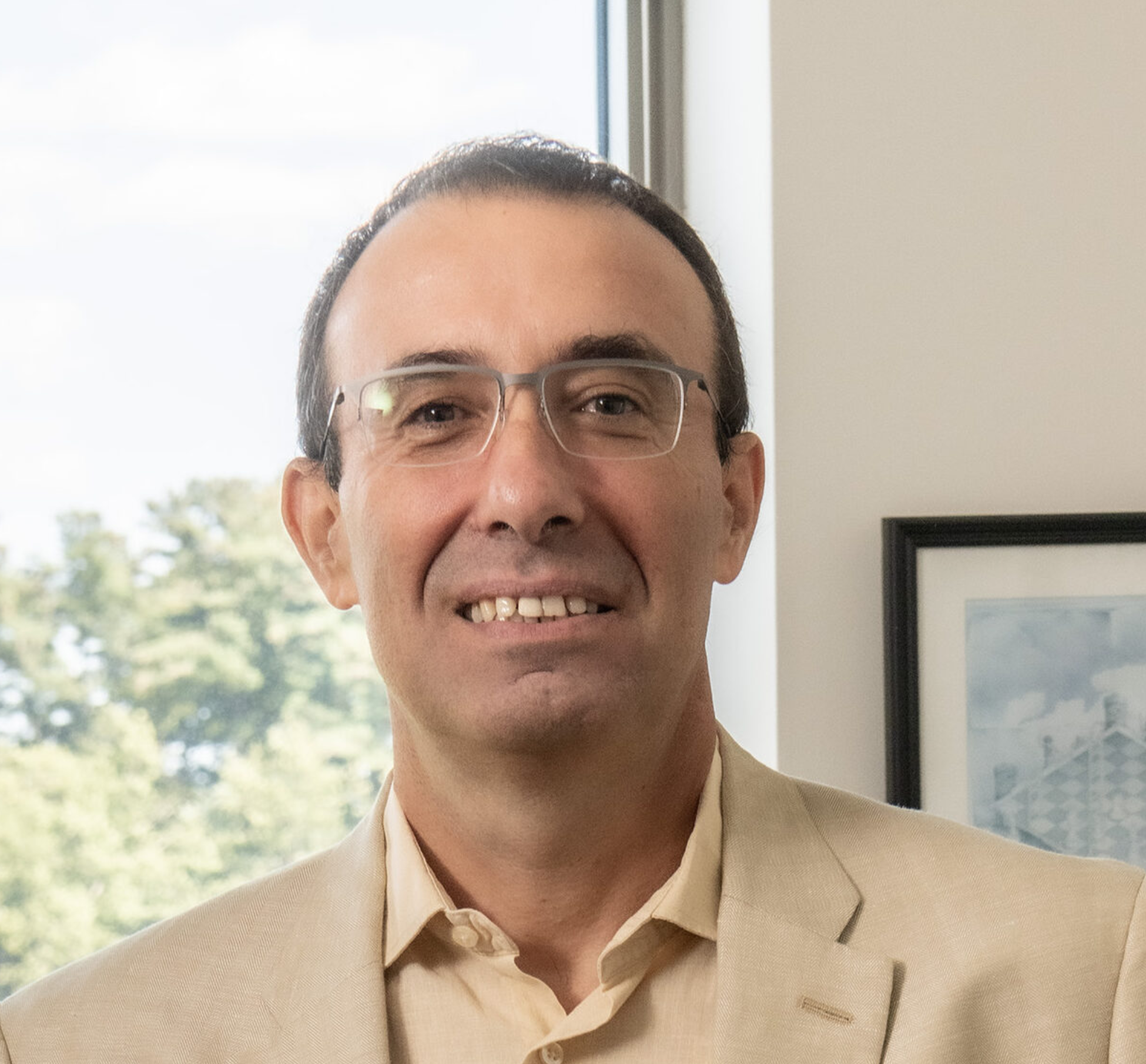 Professor M. Utku Unver